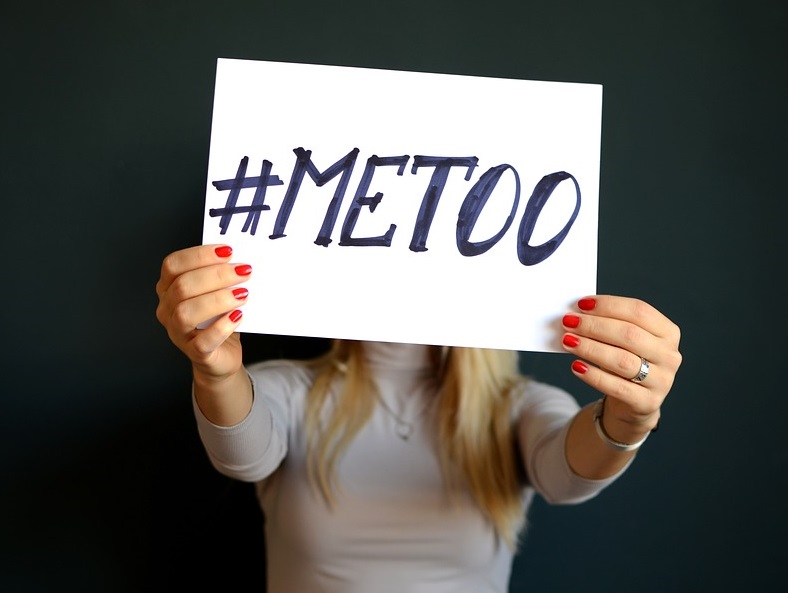 woman holding metoo sign